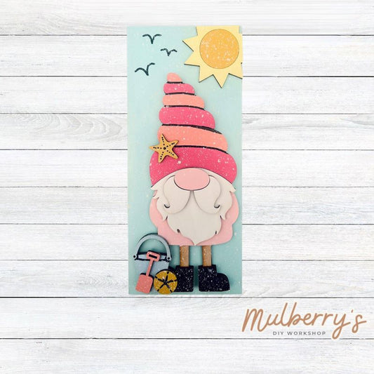 Our summer beach gnome is just too cute! Come decorate this adorable mini sign for your home! Approximately 9.5" tall by 4" wide.
