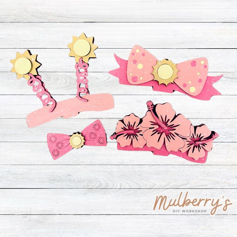 Our summer inserts pair perfectly with our Interchangeable Dinosaurs, pictured in the second picture and sold separately.

Please note that different inserts fit each type of dinosaur base differently. For our interchangeable dinosaurs, we recommended pairing each with the following:

-Brachiosaurus with Headband & Bow Tie

-T-Rex with Headbow

-Triceratops with Tropical Flower Lei