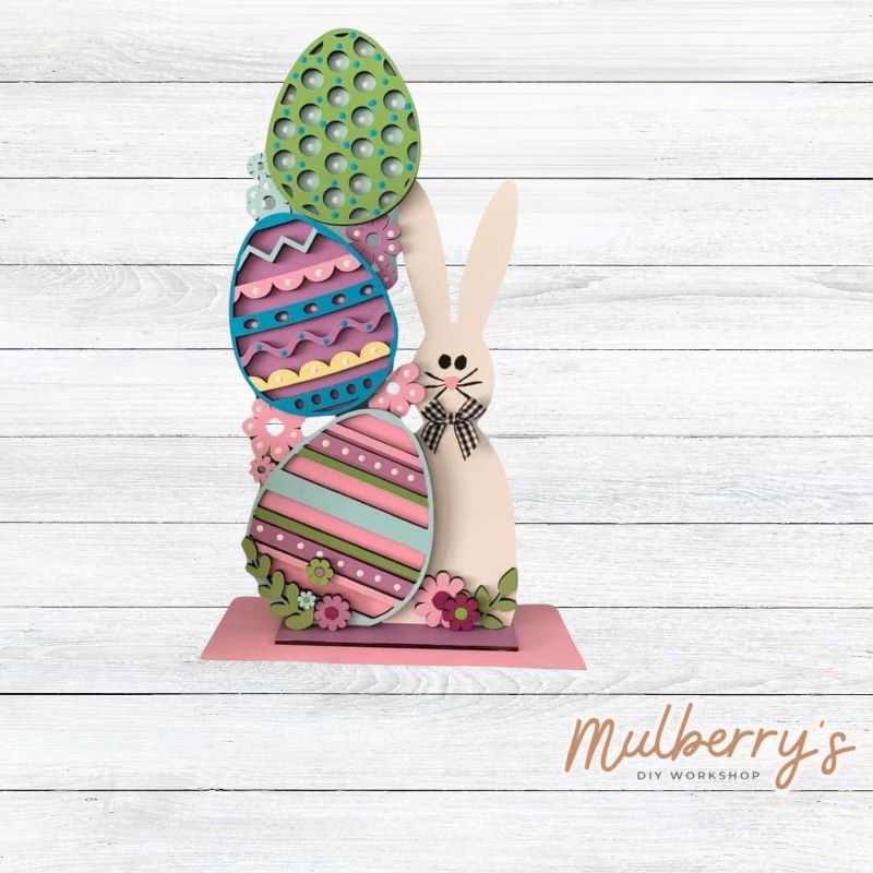 We have so many options to create your perfect personalized project! Approximately 14" tall. Bunny is optional. Please indicate which three options you would like for your three eggs.