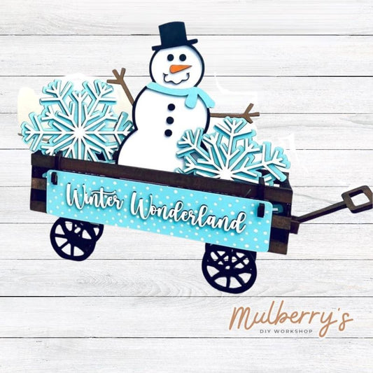 It doesn't get any cuter than our little rustic wagon! It's a perfect add on accessory to your décor.  It's approximately 4" tall x 12" wide.  Includes: Wagon and Winter Inserts. 